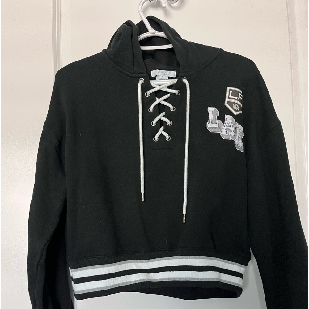 WEAR by Erin Andrews Los Angeles Kings lace up pullover hoodie.